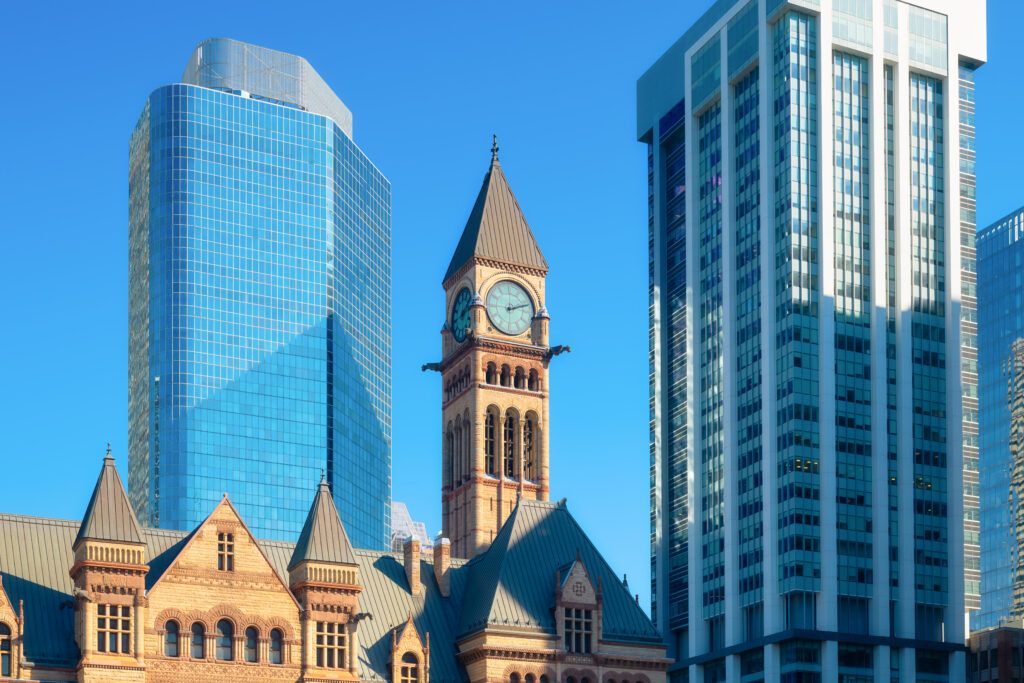 Toronto skyline with Old City Hall clock tower, representing domestic assault cases and criminal defence services in the Greater Toronto Area.